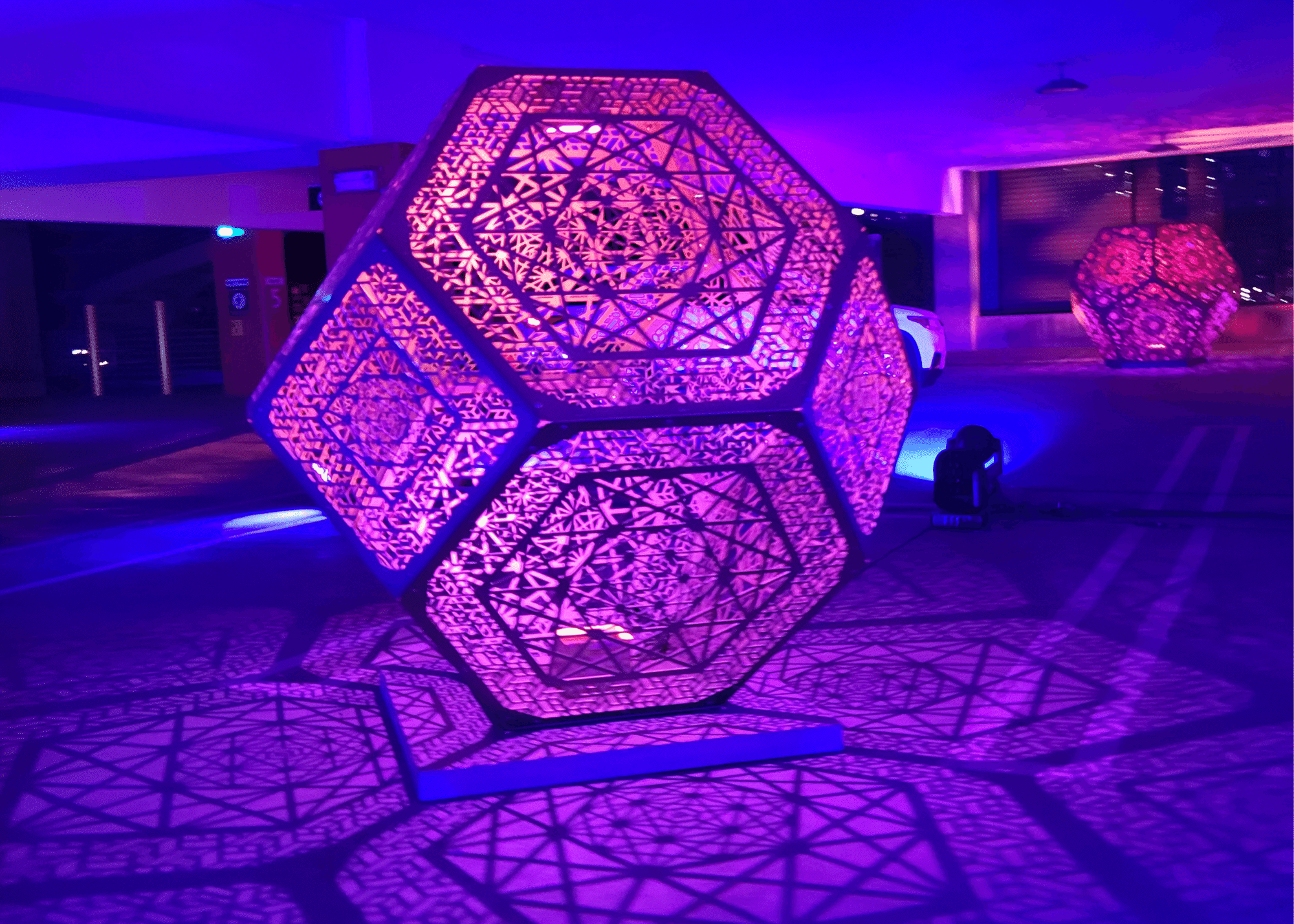 Pink and blue lighted sculpture at Arizona State University drive-through art installation