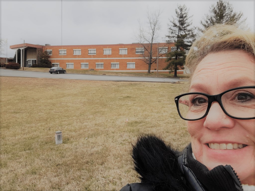 Author in front of hospital where she was born