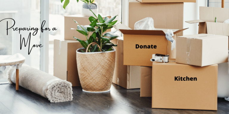 Moving boxes with things to move and donate