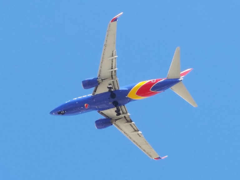 Southwest Airlines plane flying overhead